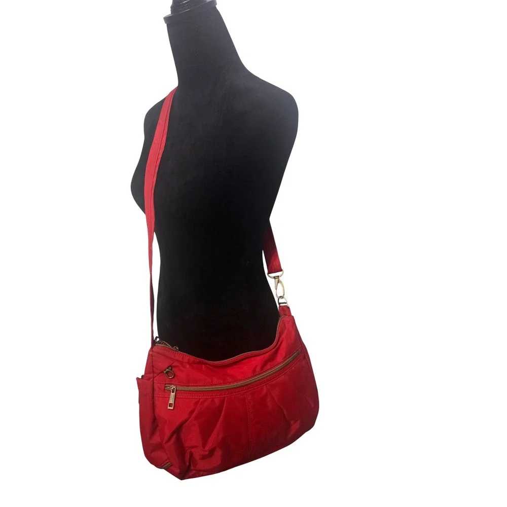 Travelon Anti-Theft Red Nylon Crossbody Hobo Bag Multiple Pockets Adjustable - Picture 1 of 11